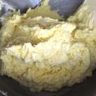 Масло взбить с сахаром.Не выключая миксер, постепенно добавить заварной крем и  взбивать до получения однородного крема.