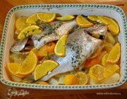Дорада, запеченная с апельсином, лимоном и картофелем Дорада, запеченная с апельсином, лимоном и картофелем